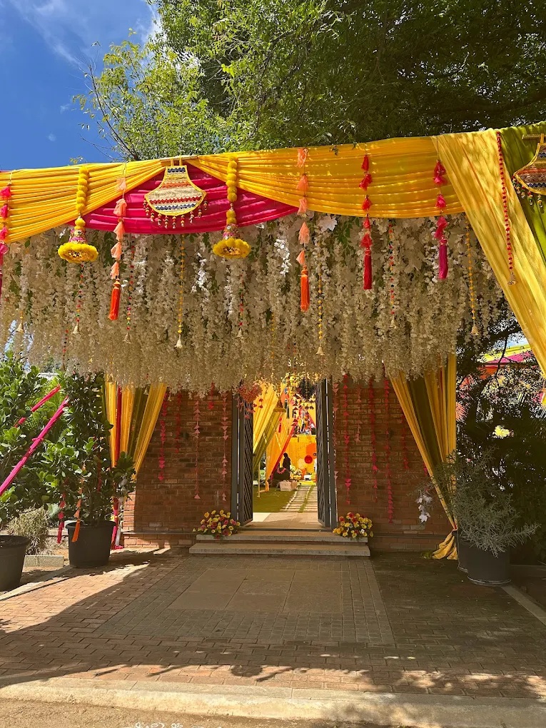 Lawn ceremony with floral aisle